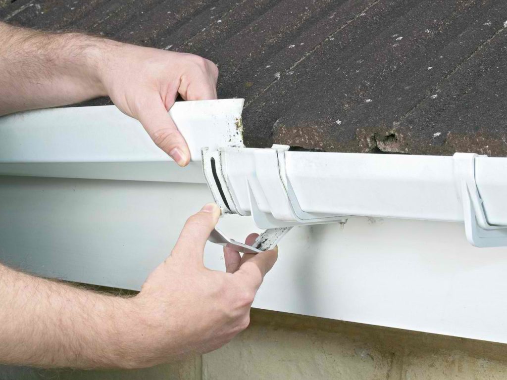 repairing leaky gutters